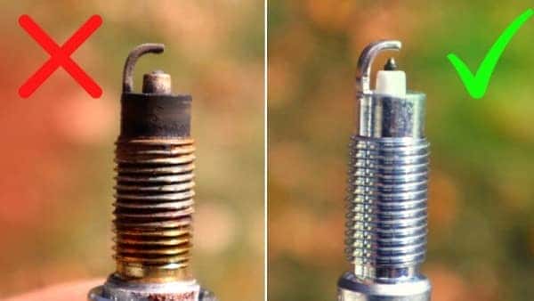 Bugi xe máy bị bẩn hoặc hỏng khiến xe đề không nổ